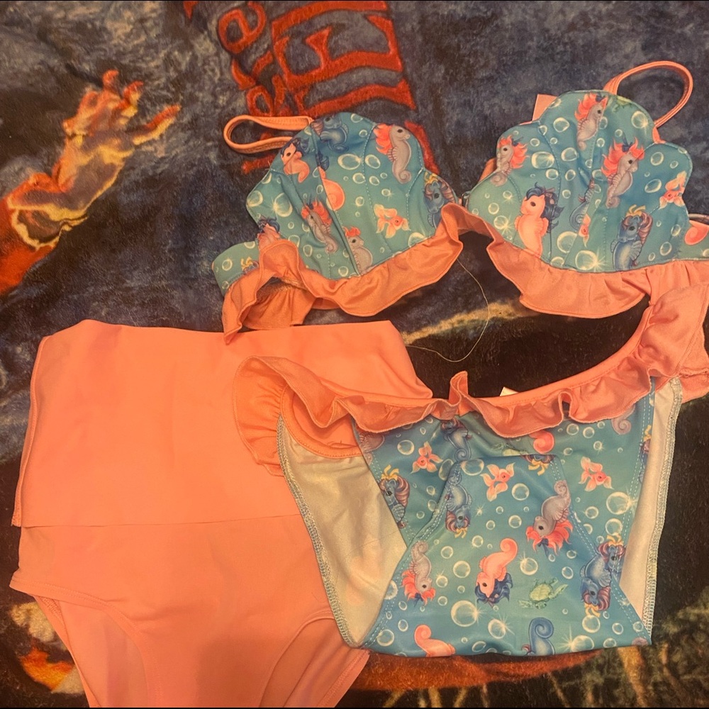 My little pony bikini size medium new with sanitary / and plastic liners